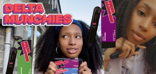 photo of two ladies holding delta munchies vape pen
